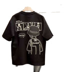 Trendy Unisex Cotton T-Shirt featuring a cartoon graphic design available in black and white colors.